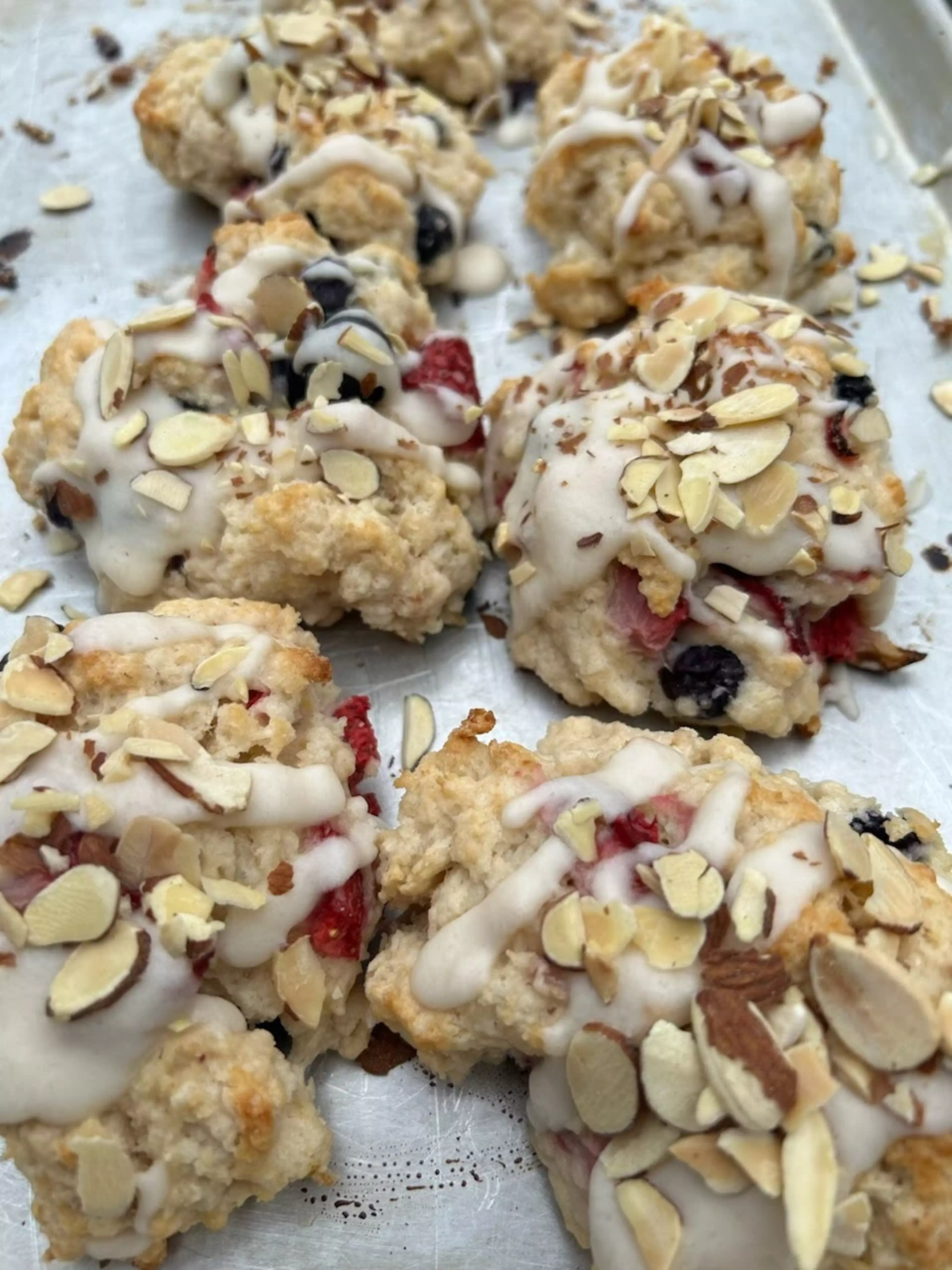 A tray full of fresh-baked nutty, fruity scones.